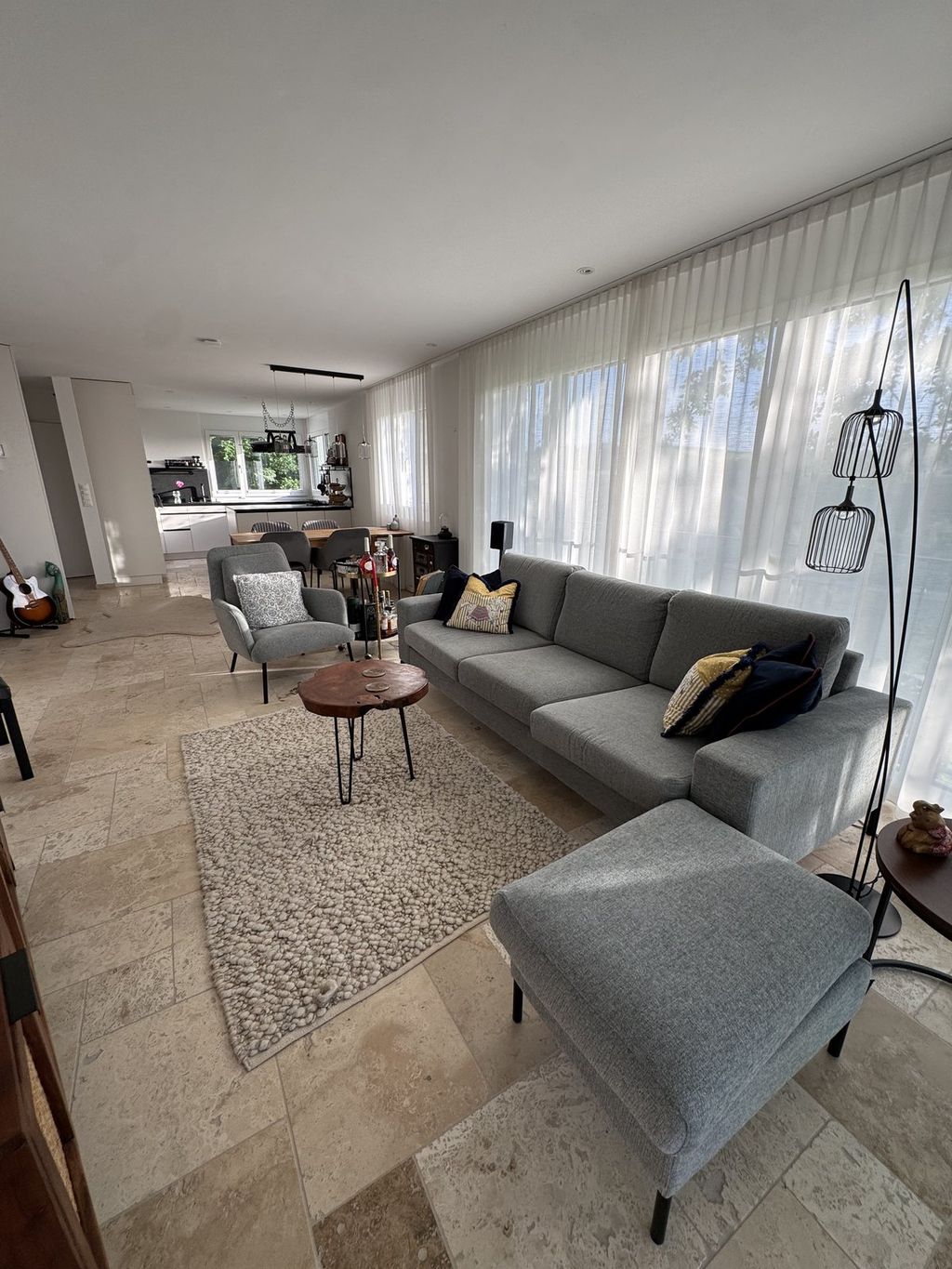 Furnished living room of Villa 77 with a designer sofa