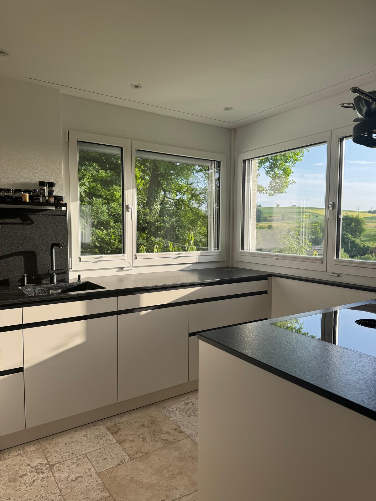 Designer kitchen with Miele appliances and Bora induction cooktop in furnished house near Zürich
