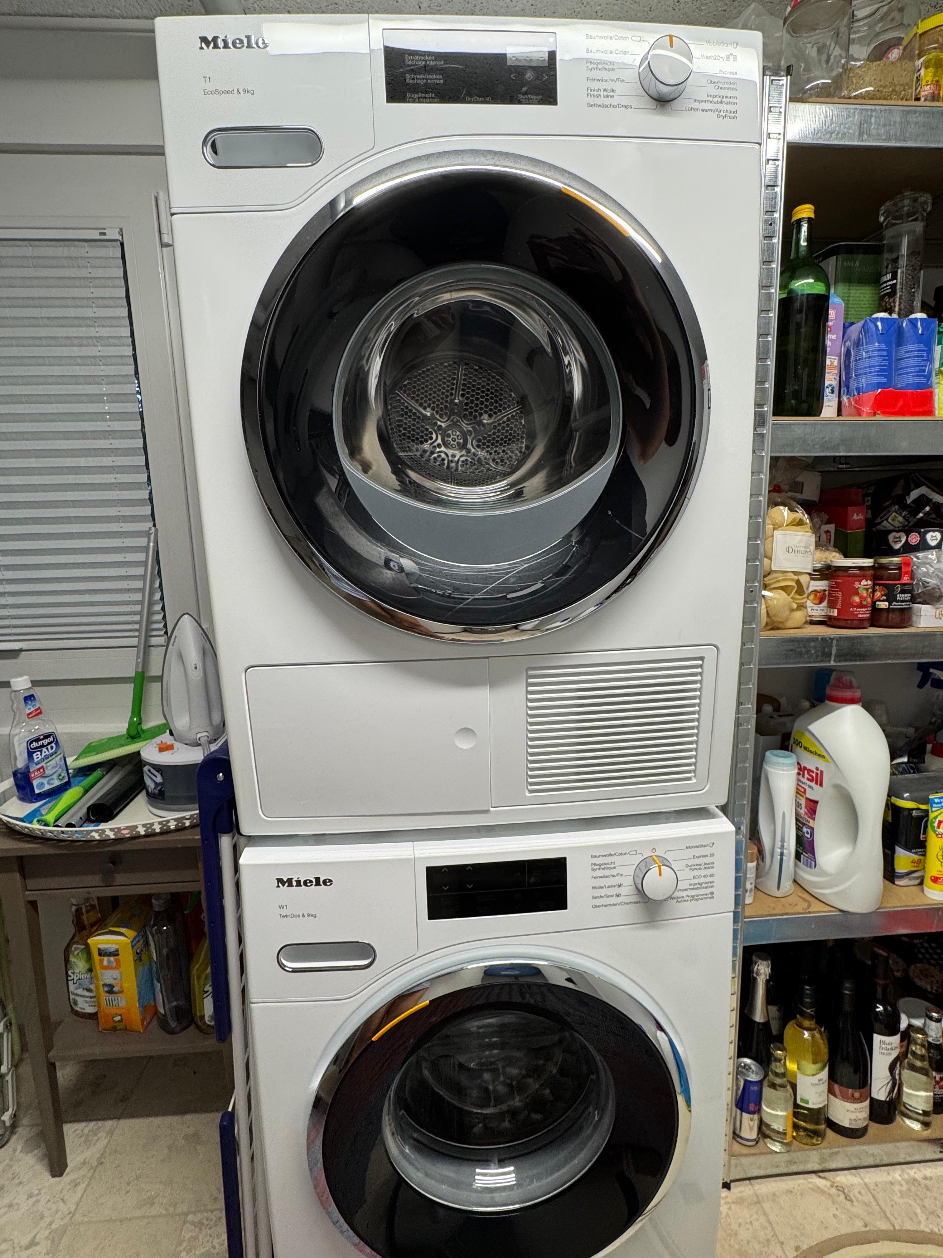 Miele washing machine and tumble dryer in the utility room of Villa 77